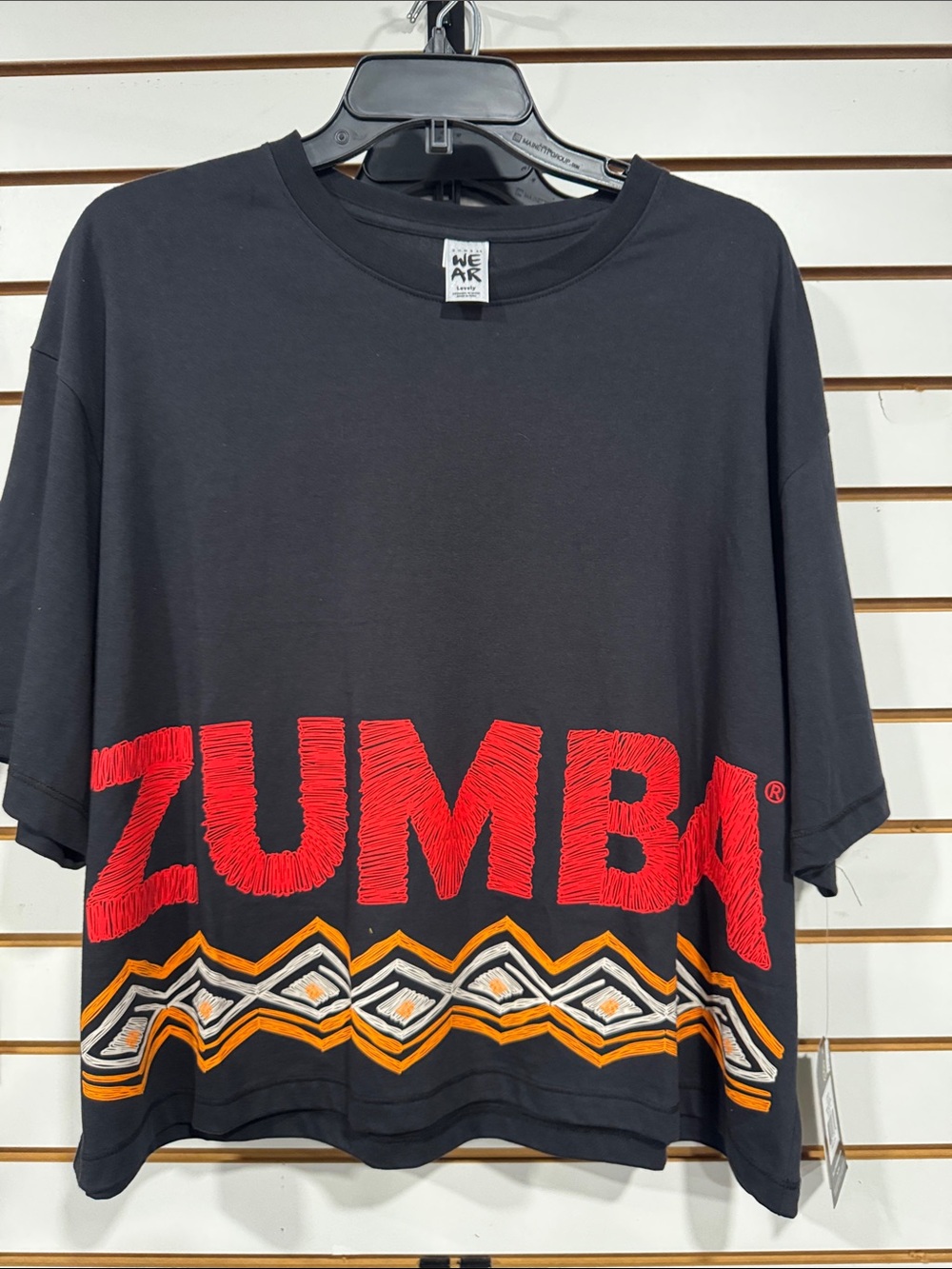 Zumba Fitness Black Crop Tee with Red Logo and Orange Pattern